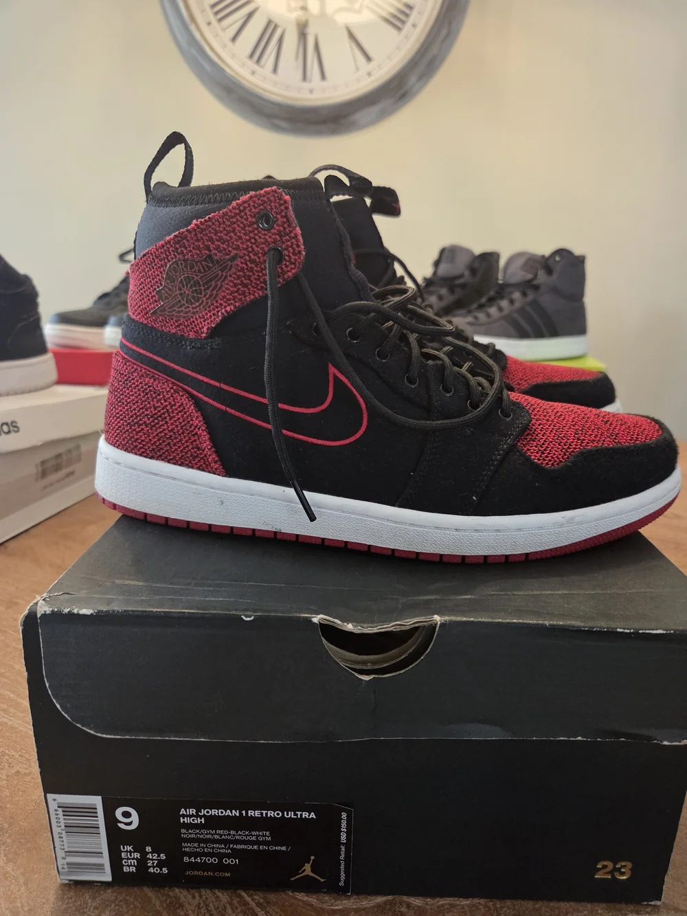 Jordan Men’s Black and Red High-Top Knit & Suede Sneakers